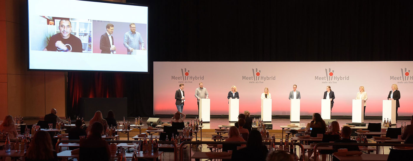 “Meet Hybrid – more than live”, hybrid event in July 2021 at the Messe und Congress Centrum Halle Münsterland. Remote simultaneous interpretation English-German.